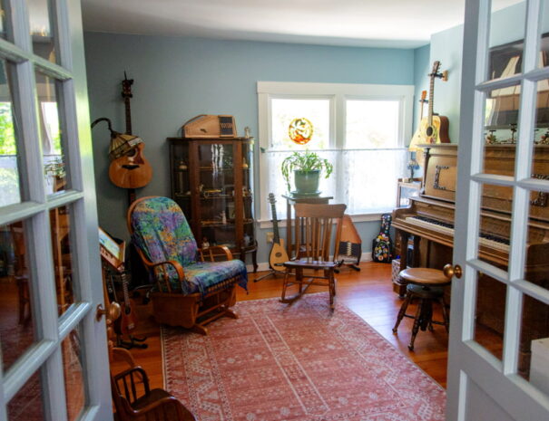Interior of music room. Piano, guitars, etc.