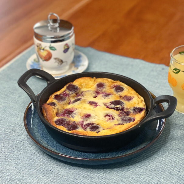 Individual cherry clafoutis baked in a mini-skillet.